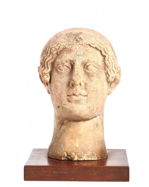 Etruscan terracotta votive head mounted on a stand