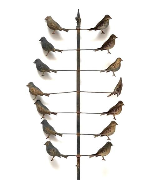 Charming garden bird whirligig yard ornament standing about 5 feet 6 inches tall with a central post, attached to which were seven spinning branches, each with a bird on either end ($1,353).
Neue Auctions